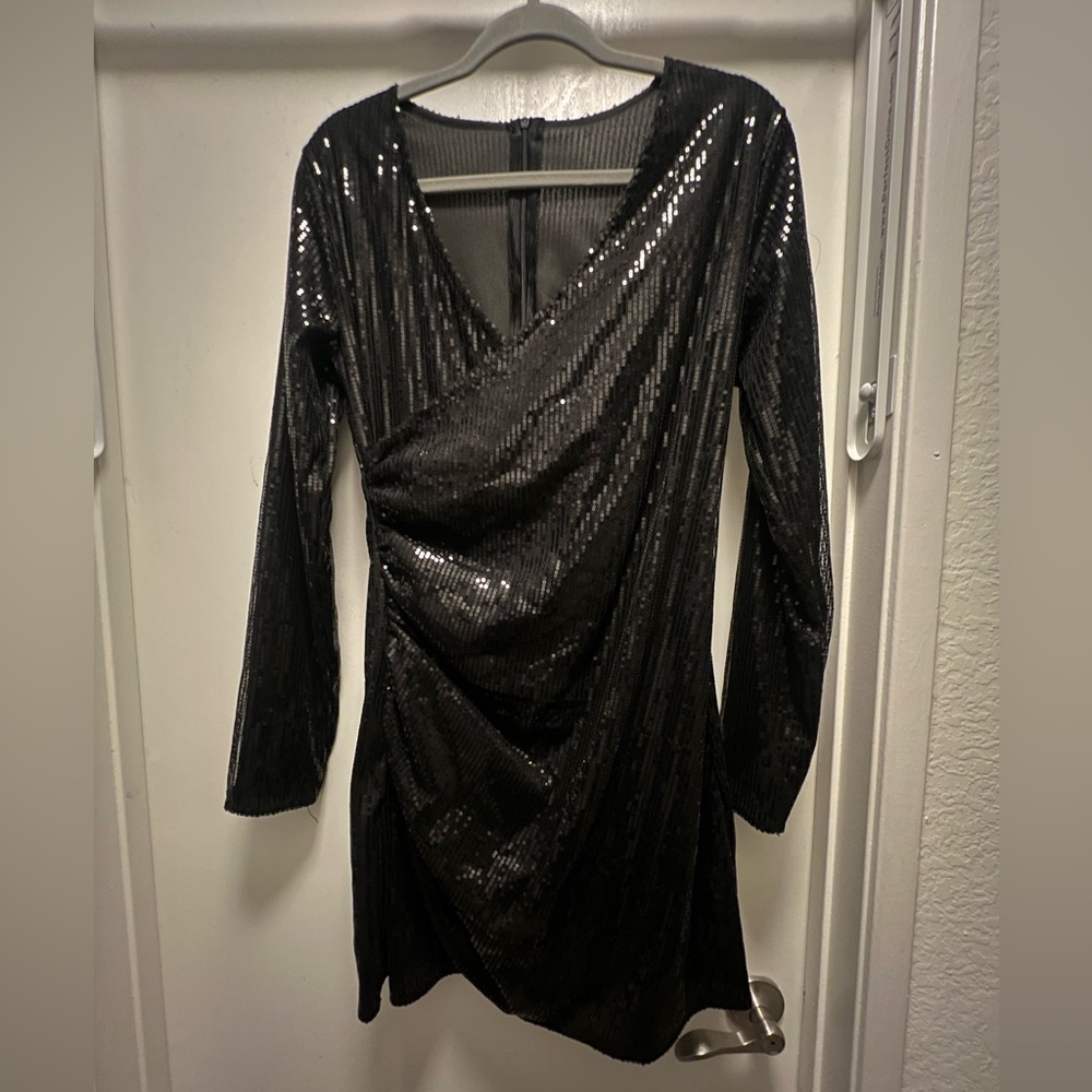 Nice black dress. Used once for a gathering.